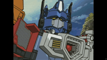 a cartoon drawing of a robot named optimus prime standing next to another robot