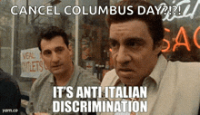 two men standing in front of a store that says " cancel columbus day " on it