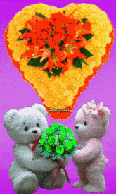 two teddy bears holding a bouquet of flowers in front of a heart shaped flower arrangement