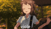 a girl is playing a guitar and the word viole is on the screen