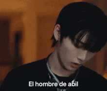 a close up of a person 's face with the words el hombre de abil written on it