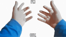 a person 's hands are reaching out towards each other with the words " i 'm out " above them