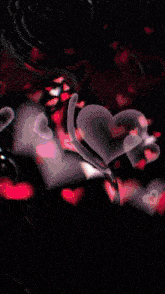 a woman wearing glasses looks at herself in a mirror with hearts behind her
