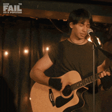 Playing The Guitar Vivek GIF - Playing The Guitar Vivek How To Fail As A Popstar GIFs