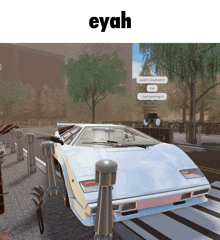 a white sports car is parked on the side of the road and says eyah on the bottom