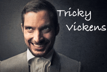 a man in a suit and tie smiles with tricky vickens written on the bottom