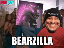 a man wearing a hat that says multivers is holding a cartoon bearzilla