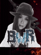 a woman wearing a hat is standing in front of a logo for bwr