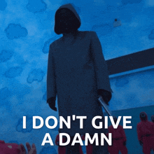 a man holding a gun with the words i don t give a damn