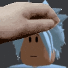 a pixel art of a person holding a towel over their head