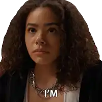 a woman with curly hair has the word i 'm on her chest