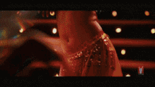 a woman 's stomach is shown in a pixelated image while she is dancing .