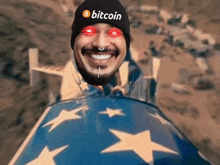 a man wearing a hat that says bitcoin on it is smiling
