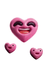 a pink heart with a smiling face is surrounded by smaller pink hearts