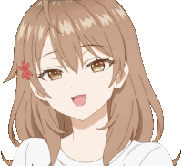 a girl with brown hair and a flower in her hair is smiling