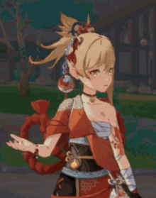a girl with a tattoo on her arm is wearing a red dress
