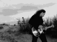 Chris Cornell GIF - Chris Cornell Playing Guitar GIFs