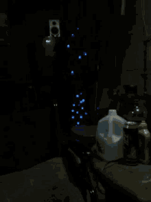 a gallon of milk sits in a dark room