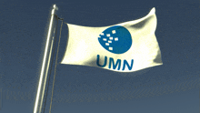 a white flag with a blue circle and the word umn on it