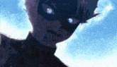 a close up of a person wearing a black mask