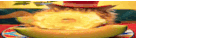 a cat wearing a red and white hat is sitting on top of a cantaloupe slice .
