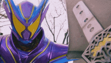 a close up of a purple and blue superhero and a domino set