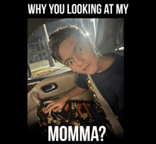 a picture of a boy in a car with the caption why you looking at my momma ?