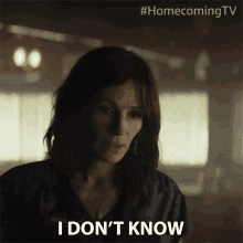 a woman says " i don 't know " while wearing a scrub top