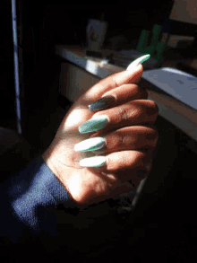 long nails aqua green close up