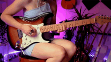 Playing The Guitar Sophie Burrell GIF - Playing The Guitar Sophie Burrell Plucking The Strings GIFs