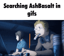 a man and a woman are searching ashbasalt in gifs on a laptop