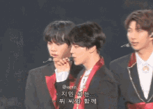 a couple of men standing next to each other with a caption that says vxmin love