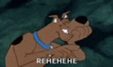 scooby doo from the scooby doo cartoon is making a funny face with his mouth open .