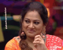 a woman 's face is shown in a gif with the words imgplay below it