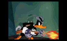 Daffy Duck Shoot GIF - Daffy Duck Shoot Machine Gun GIFs