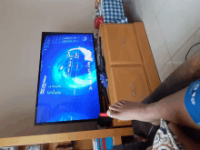 a person playing a video game on a flat screen tv that says it was a nightmare