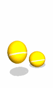 two yellow tennis balls are flying in the air