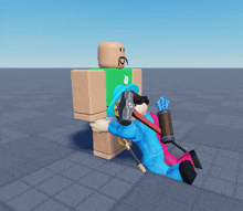 a man in a green shirt is holding a hammer while another man in a blue shirt is holding a bow and arrow
