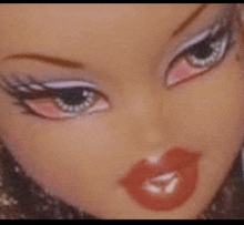 a close up of a doll 's face with red lips and white eyebrows .