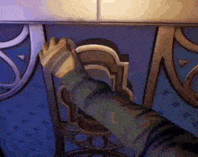 a person 's hand is reaching out to open a door in a video game .