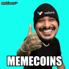 a man wearing a beanie with the word valoro on it giving a thumbs up