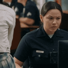 a police officer named chen is looking at a computer screen