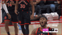a basketball player with the number 30 on his shirt