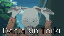 a picture of a rabbit with the words dania sin torki written on it