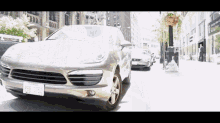 a silver car with a license plate that says 926 atb
