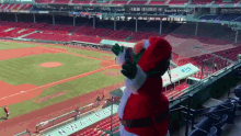 Boston Red Sox Wally The Green Monster GIF - Boston Red Sox Wally The Green Monster Santa Claus GIFs