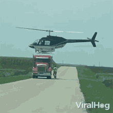 Chopper Landing On A Truck Viralhog GIF - Chopper Landing On A Truck Viralhog Helicopter GIFs