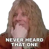 a man with long blonde hair covering his mouth with his hand and the words never heard that one above him