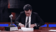 Stephen Colbert Cant Find It GIF - Stephen Colbert Cant Find It Files GIFs