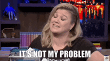 Kelly Clarkson Watch What Happens Live GIF - Kelly Clarkson Watch What Happens Live Its Not My Problem GIFs